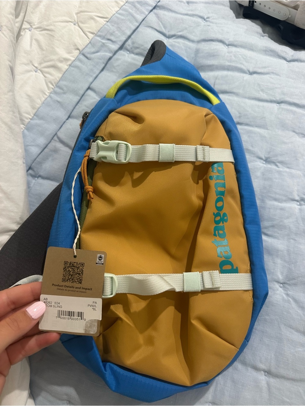 Patagonia Blue and Mustard Men’s Sling Bag with Light Strap Accents